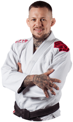 Head Coach Pawel Kozlowski im weißen Gi mit schwarzem Gürtel